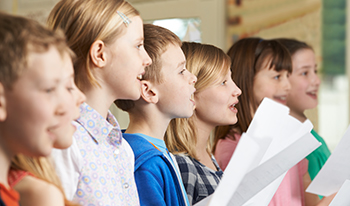 Group of children singing in choir