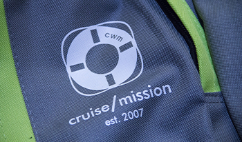 Closeup of Cruise With A Mission logo on a backpack